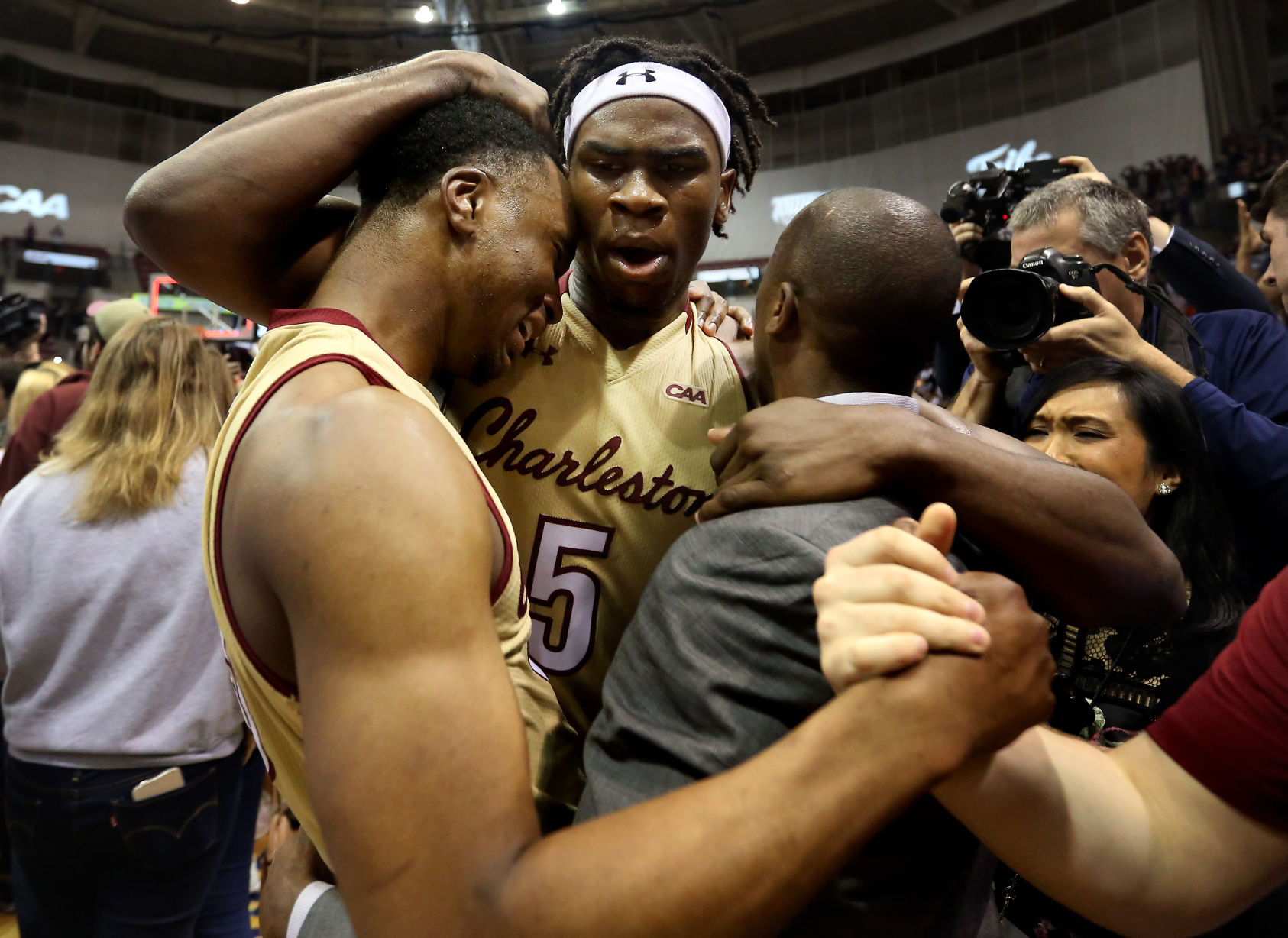 news lede coach hug.jpg